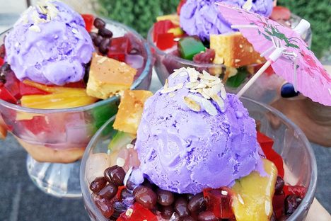 Ube ice cream atop festive bowls of halo-halo.