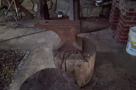 An anvil in the blacksmith shop.