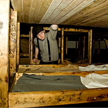 A historical reenactor in what was Burrows and Sons Chinese Laundry.