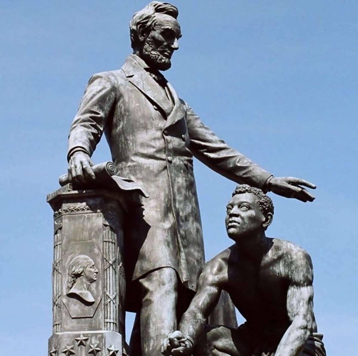 The Emancipation Memorial in Washington, D.C., depicts Abraham Lincoln standing over an emancipated Black man, modeled on Archer Alexander.