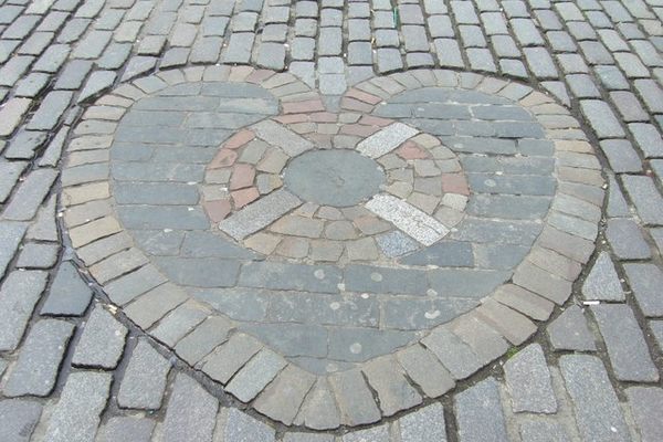 The Heart of Midlothian marks the former entrance to the Old Tolbooth.