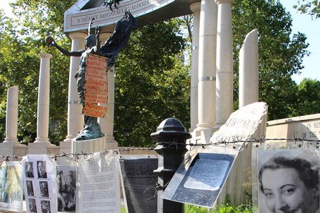 Makeshift memorial at the base of the statue