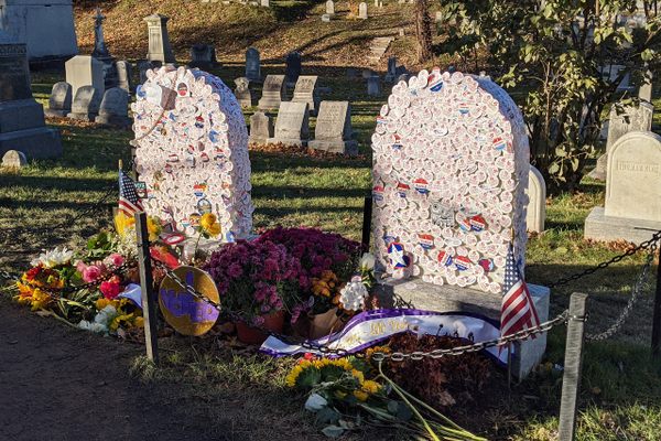 The Susan B. Anthony (left) and Mary Stafford Anthony (right) graves covered in voting stickers in 2020.