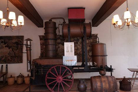A traditional Armagnac alembic is on display. 