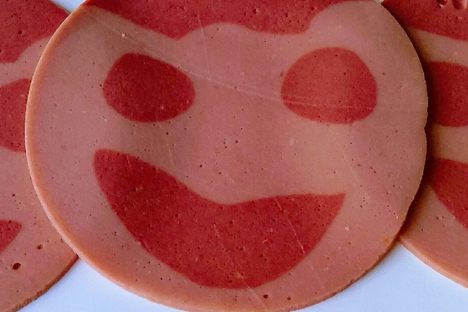 A row of smiling meat. 