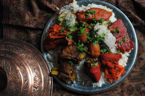 Meat piled high and served on a trami.