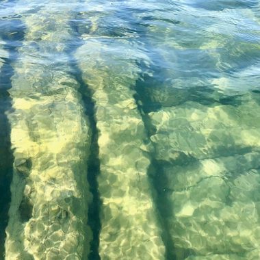 The wreck lies in shallow water.