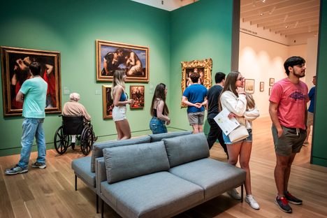 People explore one of the Palmer Museum of Art’s many galleries.  