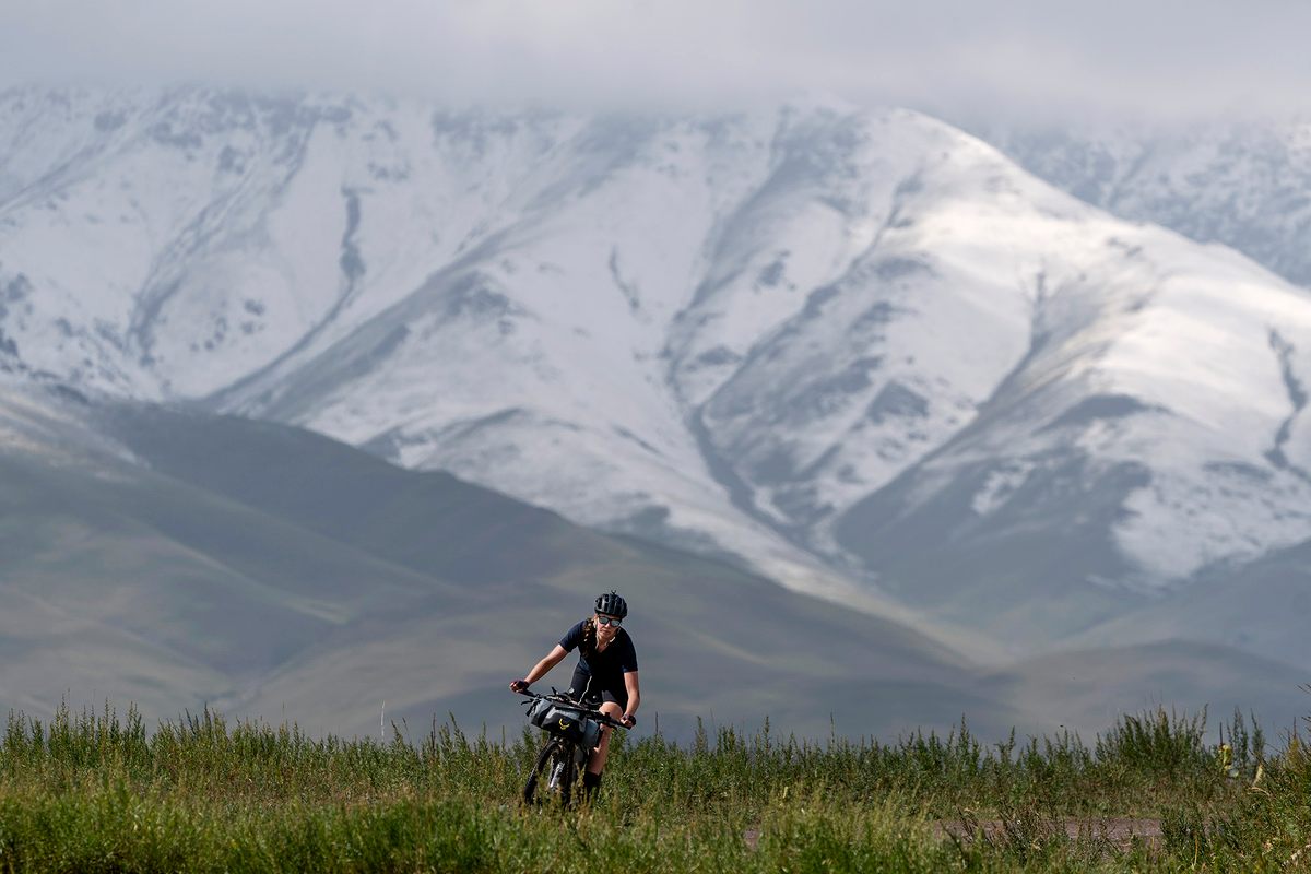 Jenny Tough from Canada rides in the mountains of Kyrgyzstan.