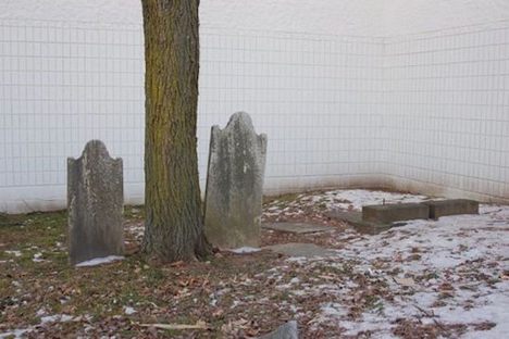 The two standing stones in the cemetery.
