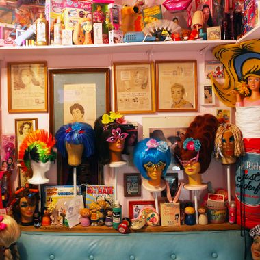 An array of wigs on display.