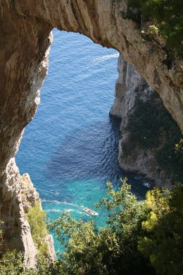 Arco Naturale“ is a natural limestone arch that forms a bridge between two  pillars of rock.