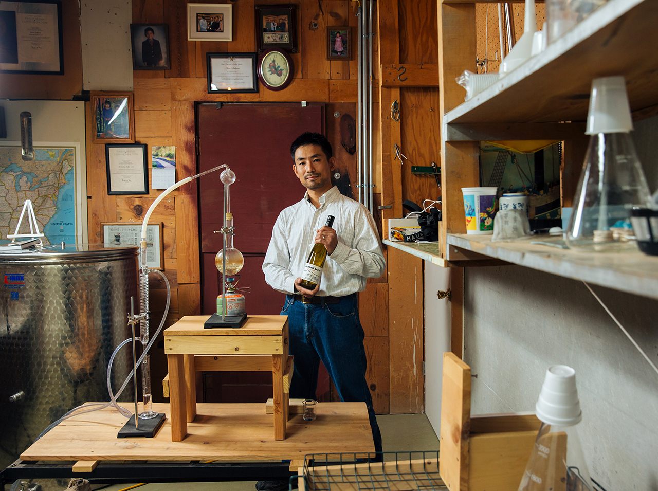 Atsuo Sakurai poses with his Arizona Sake equipment in Holbrook, Arizona.