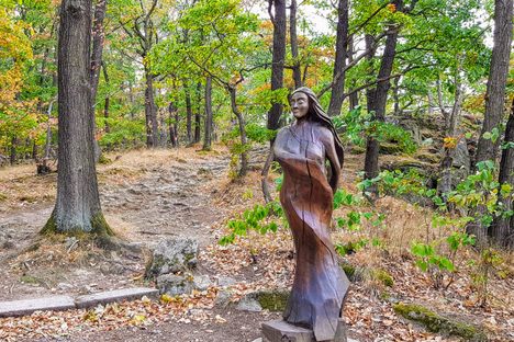 Witch carving in the woods leading to the Witches' Dance Floor.