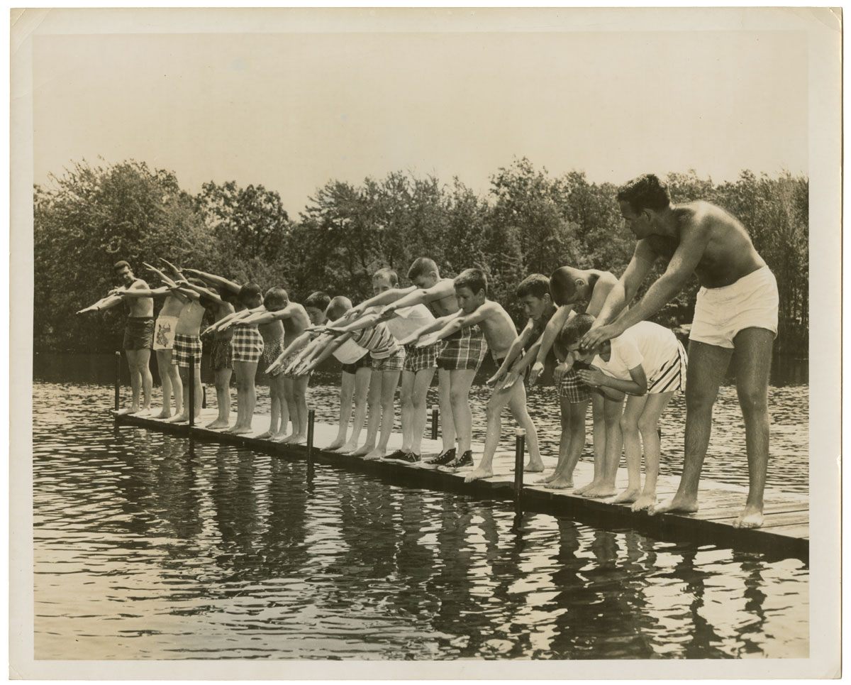 Boys at a swimming lesson at a country camp, c. 1950.