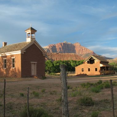 Two of the last remaining buildings of Grafton, Utah, a ghost town south of Zion National Park (which you can see in the background). The schoolhouse was built in 1886, it was also used as a church and public meeting place.