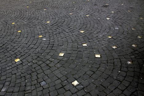 Golden cobblestones represent children born under a full moon.