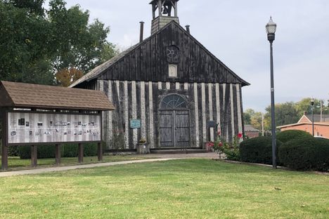 Front of Holy Family Log Church.