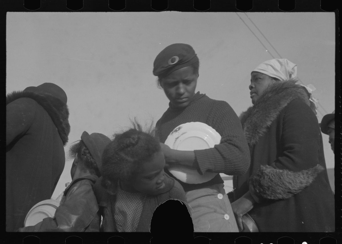 <em>Untitled photo, possibly related to: Negroes in the lineup for food at mealtime in the camp for flood refugees, Forrest City, Arkansas.</em>