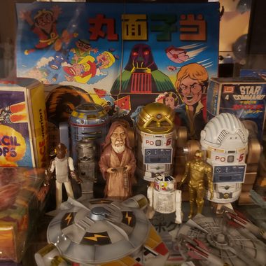 A shelf full of unofficial merchandise.