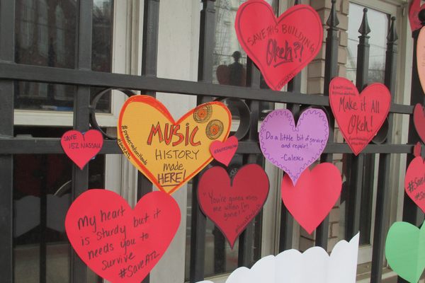 Supporters of the campaign to save 152 Nassau have been posting little paper hearts on the front of the building.