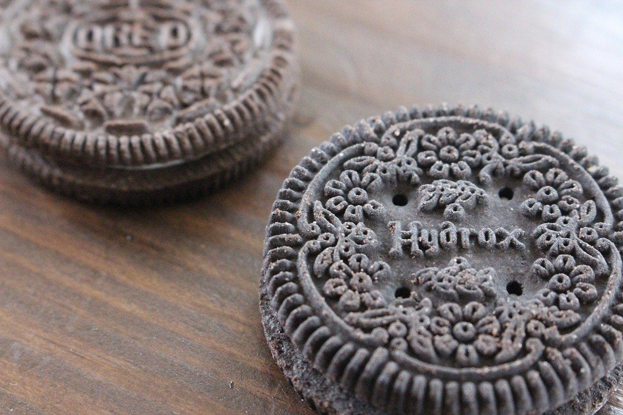 Both Hydrox cookies and Oreos sport elaborate designs, creme centers, and a long history. 