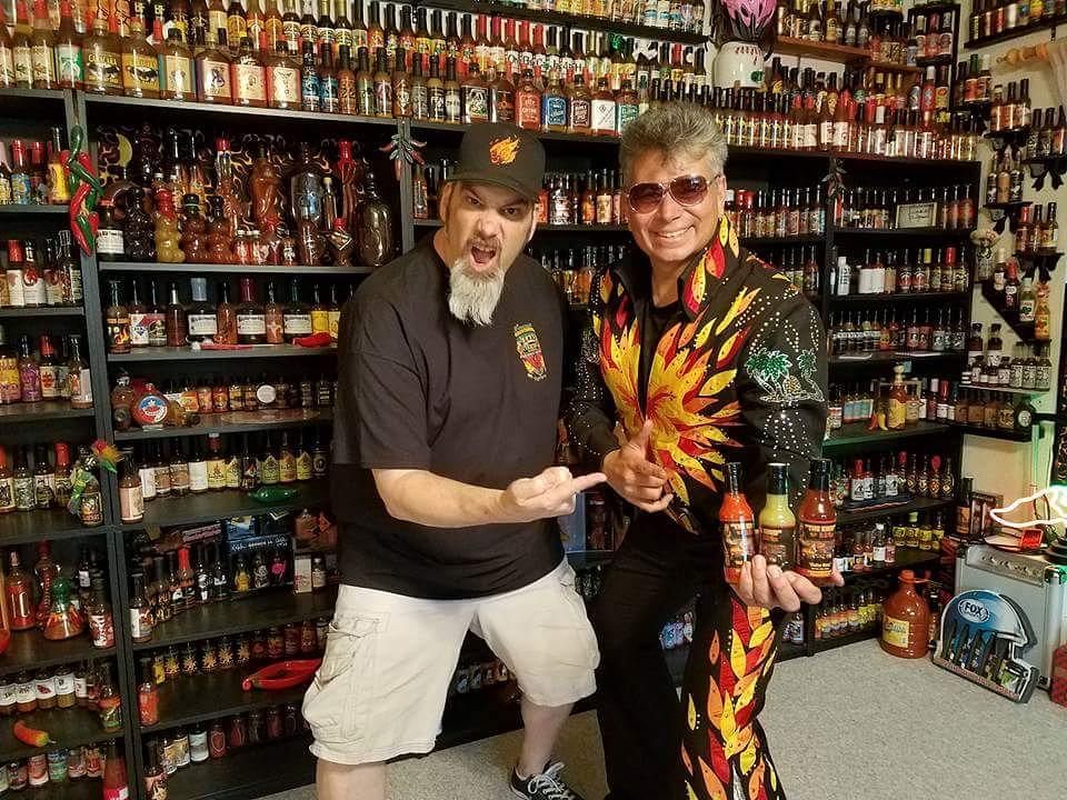 Clinco (left) celebrating an addition to his collection.