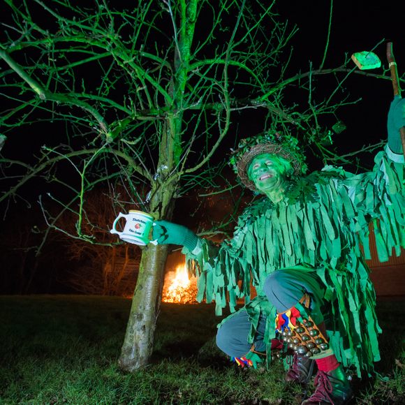 Some revelers dress as the "Green Man," a folkloric figure.