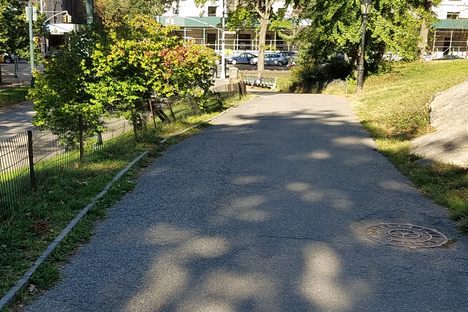 The manhole covers looking back at 85th and Central Park West