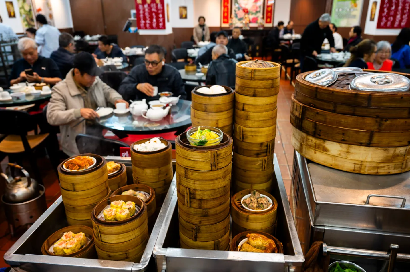 Servers tally up your order on paper notebooks as you select your dishes from the cart. 