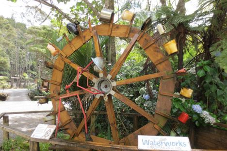 A metal man turns the wheel (which was actually run by water).