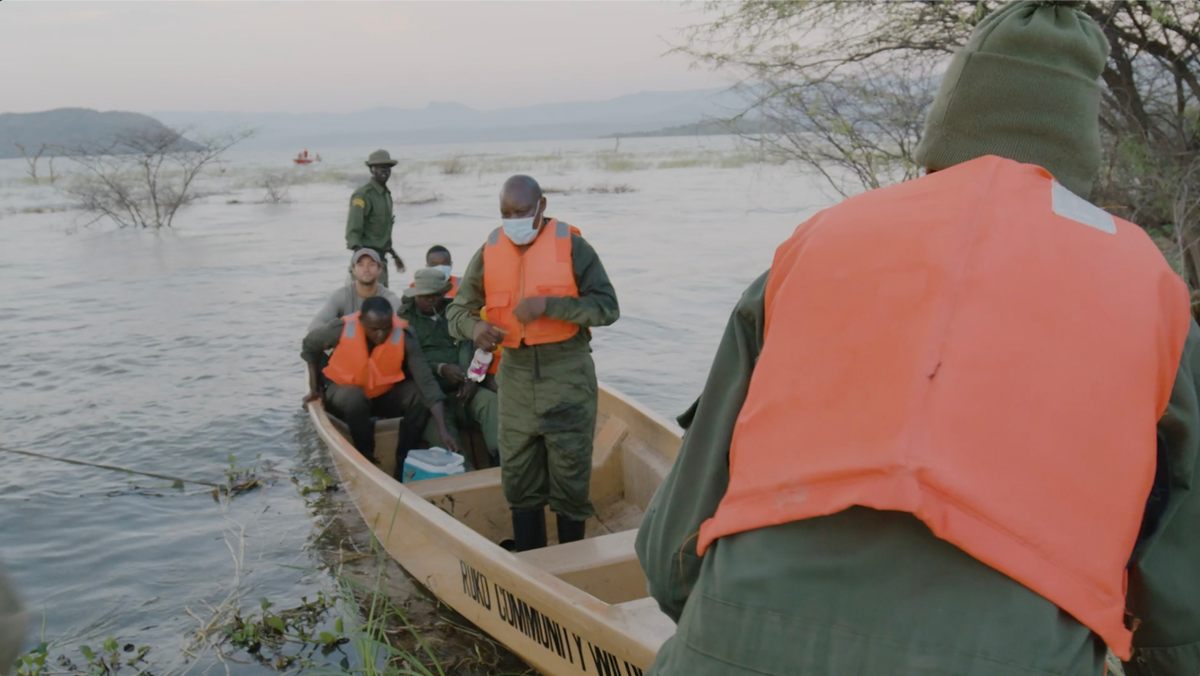 Conservationists arriving on the island during the rescue attempt for Asiwa.