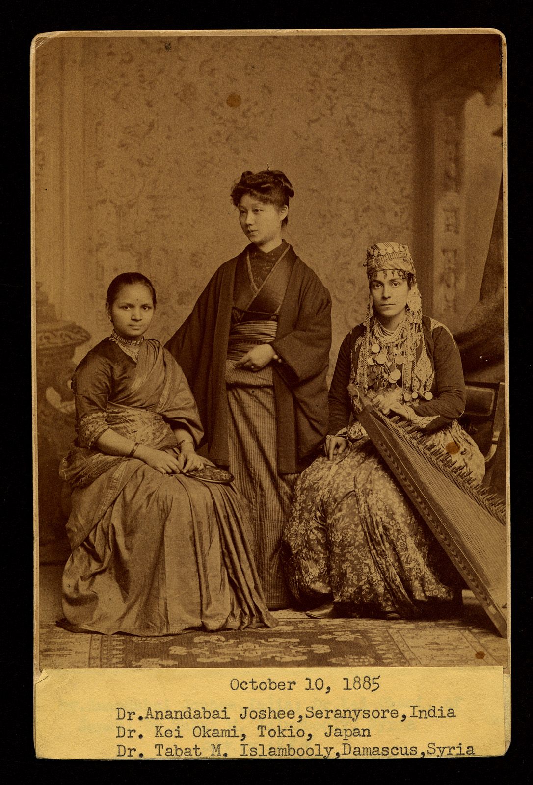 International students Anandabai Joshee, Kei Okami, and Tabat Islambooly, photographed at the Dean's Reception on October 10, 1885.