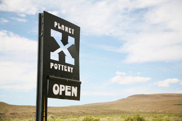 "Planet X Pottery" roadside sign