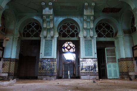 Three doors leading to the internal court