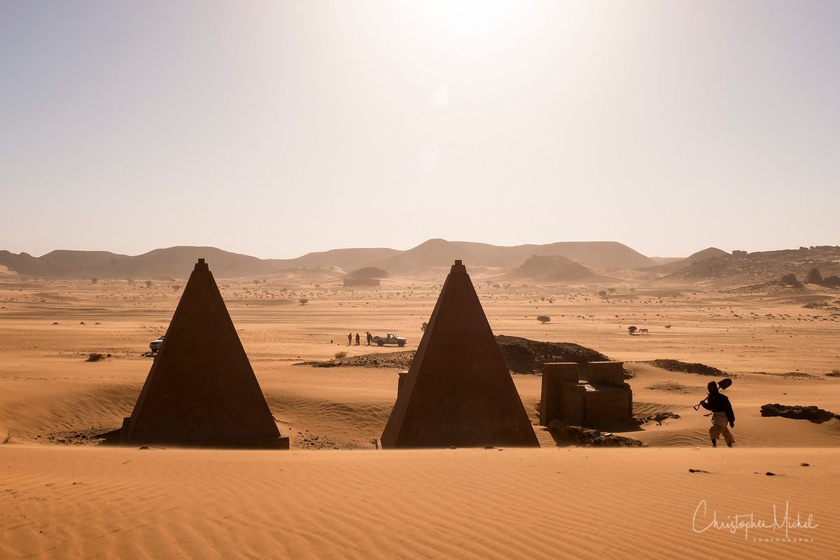 Workers are constantly digging sand from around the pyramids to keep the desert at bay.