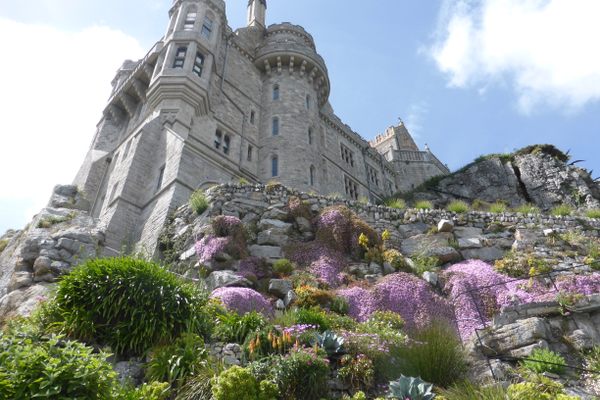 The castle on St. Michael's Mount towers over precarious gardens.