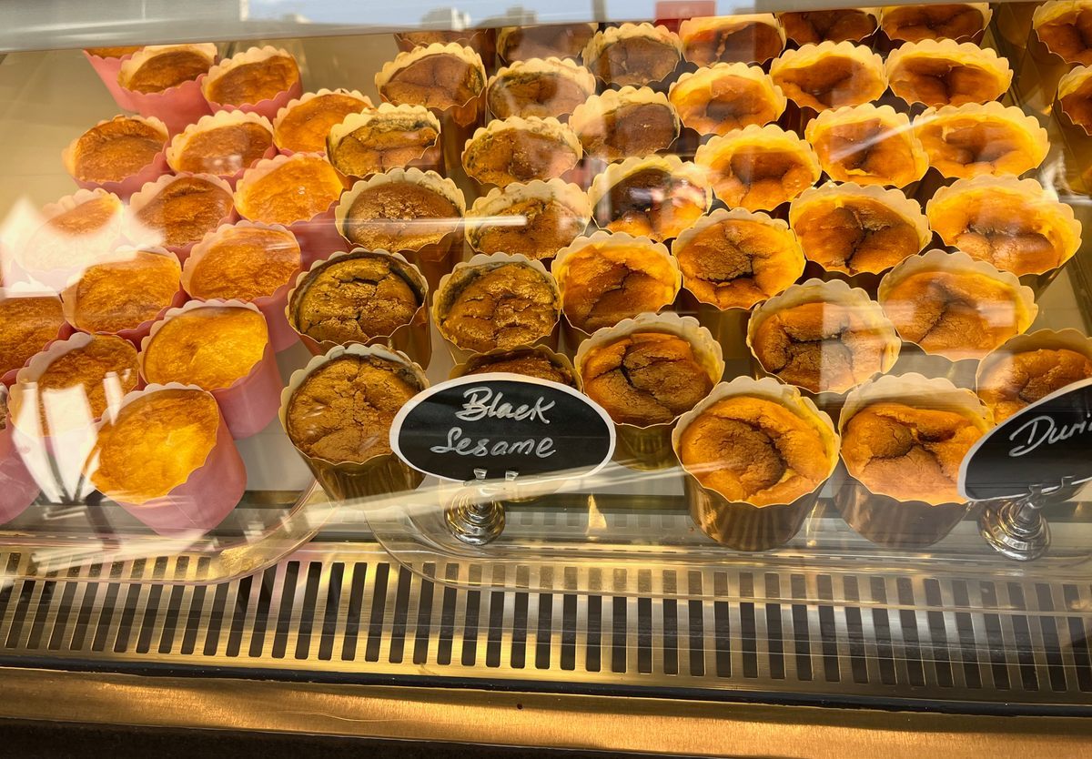 Mini-burnt Basque-style cheesecakes in a variety of flavors at Kuih Café in New York.