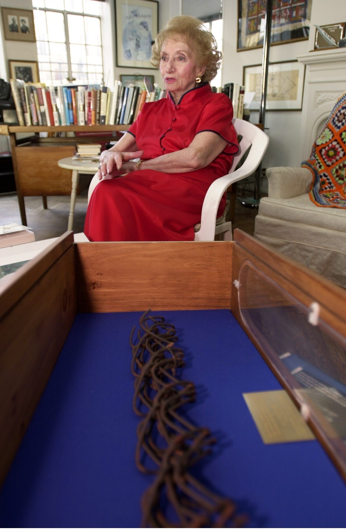 Ruth Gruber in 2000, with one of her most prized possessions—a four-foot piece of barbed wire from Fort Ontario. Gruber passed away in November 2016 at the age of 105.