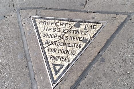 Stand on the tiniest, angriest piece of private property in the city.