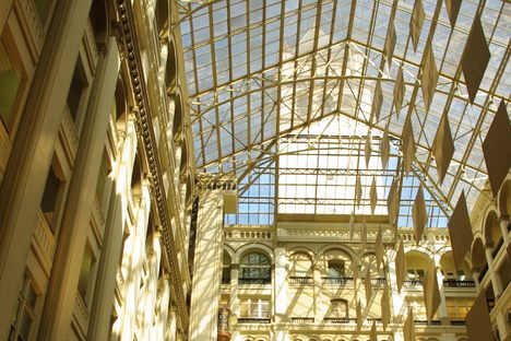 Covered for many years until renovations in the ‘70s and ‘80s, the glass skylight now lets in sun and offers a glimpse of the clock tower.
