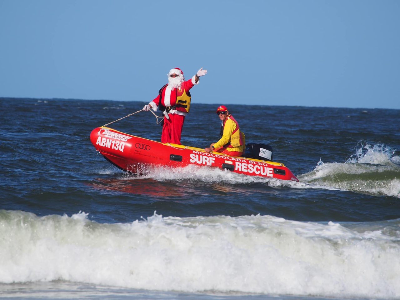Some years, the water is so choppy, Santa arrives on Mooloolaba  beach in a soaking wet red suit.
