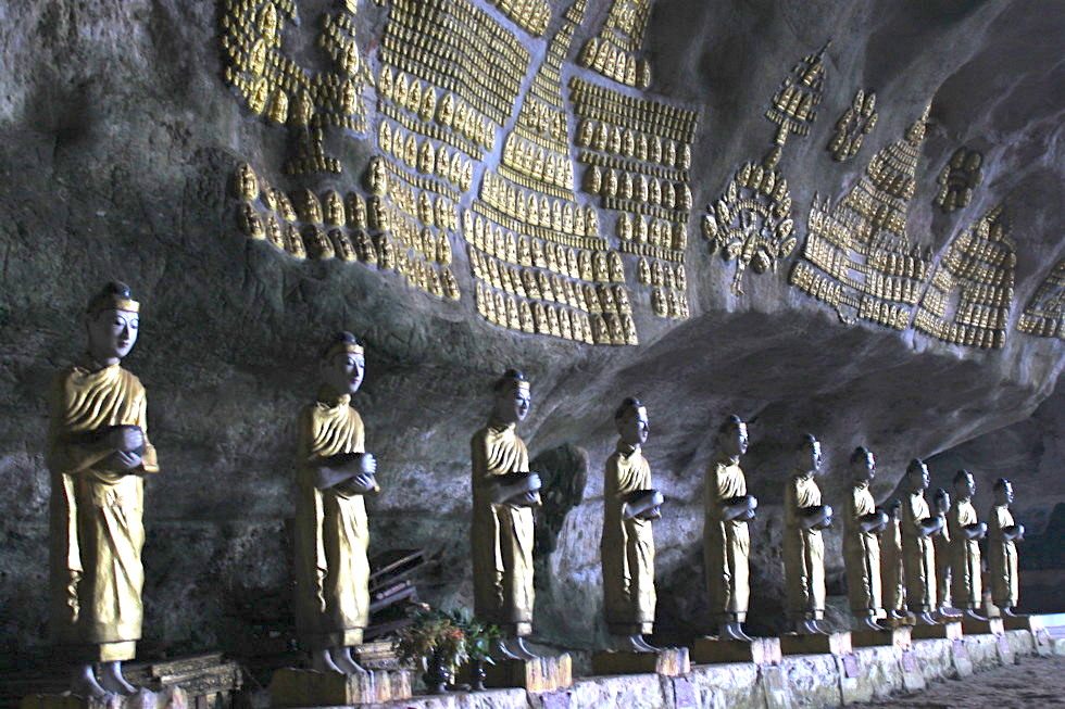 Buddhist statues dominate the entrance