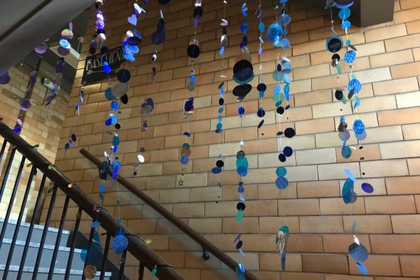 Anastasia Zielinksi’s “Rainbow Showers,” a stairwell art installation.