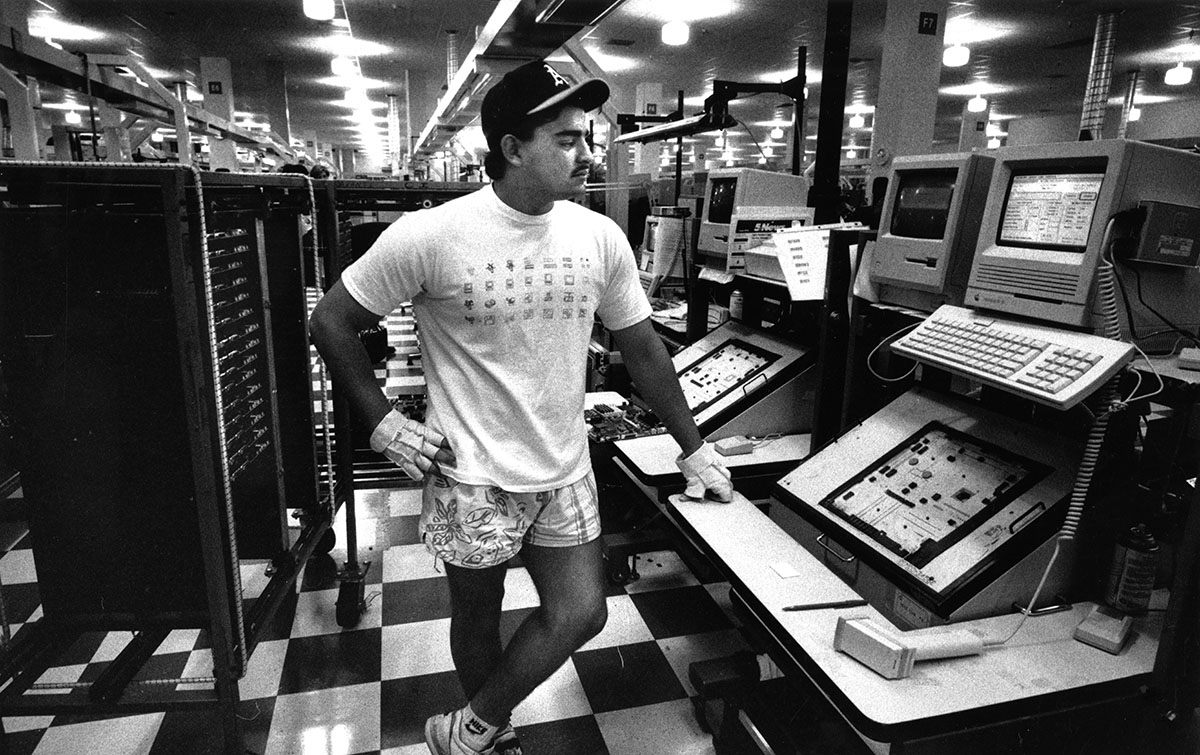 May 29, 1990: Luis Morales works at an Apple manufacturing facility in Milpitas.