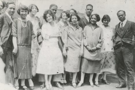 A party on the roof of Regina Anderson's home, at 580 St. Nicholas Ave. in Harlem. From left to right, attendees included Ethel Ray (Nance), Langston Hughes, Helen Lanning, Pearl Fisher, Regina Anderson (Andrews), Rudolf Fisher, Luella Tucker, Clarissa Scott (Delany), Esther Popel, Hubert Delany, Jessie Fauset, Marie Johnson and E. Franklin Frazier.