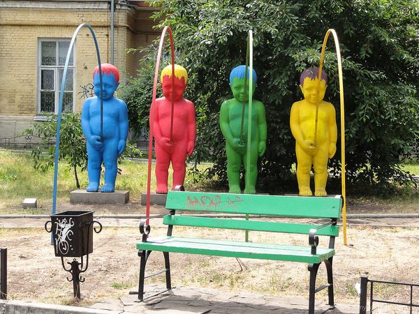 Boys and girls peeing outdoors