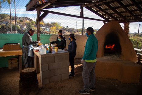 Everyone celebrated the completion of the horno with a meal of chicken stew.