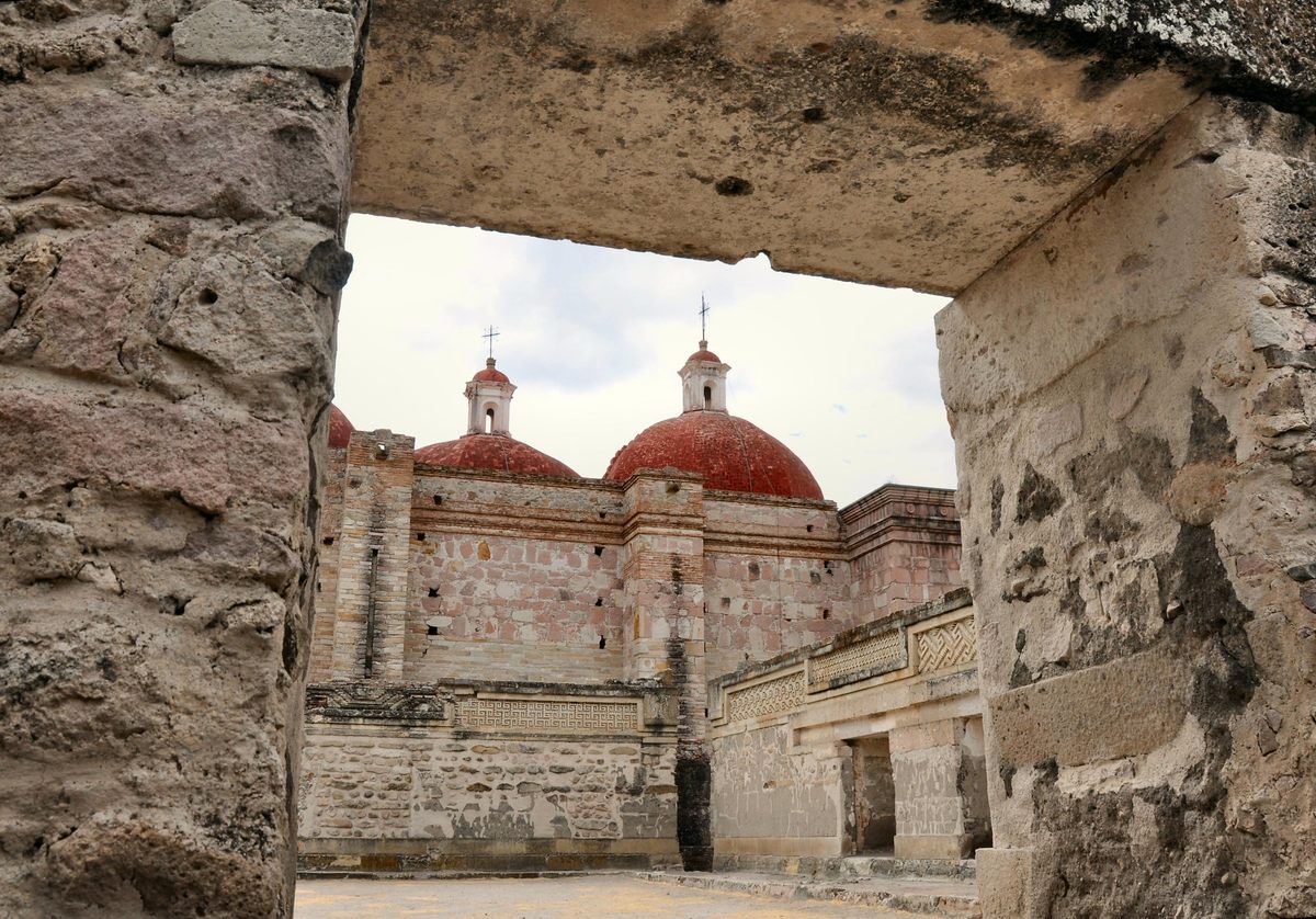 In Mitla, a colonial Church peeks over Zapotec ruins. 