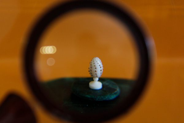 An easter egg through magnifying glass. The actual height is  4.5 mm, the beads 0.15-0.35 mm